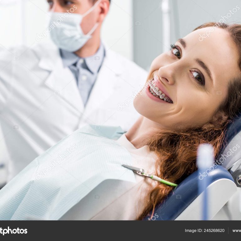 depositphotos_245268620-stock-photo-selective-focus-beautiful-woman-braces